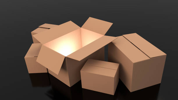 istock the brown paper boxes on black background 1240971551