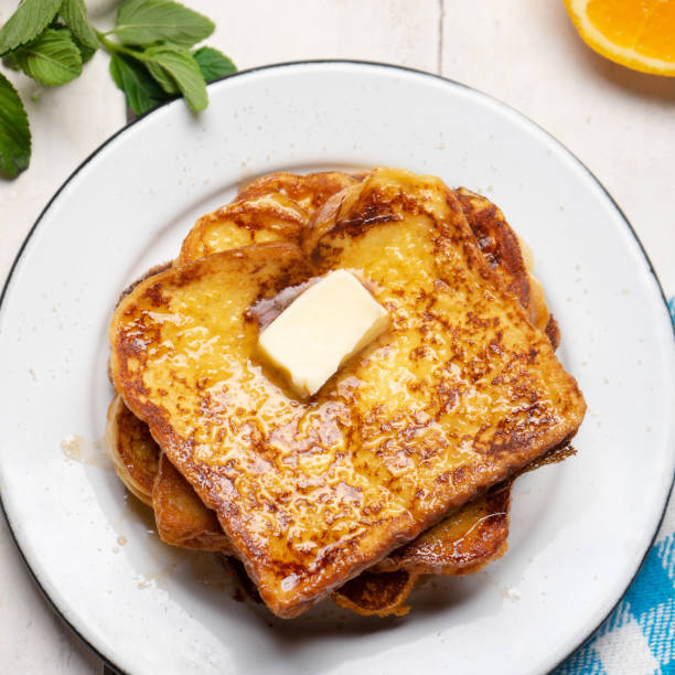 istock French toast with cinnamon on white background 1240971770