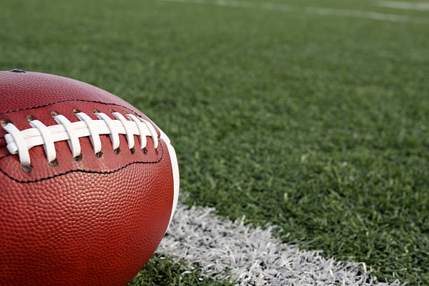 istock Football with the field beyond 124098303