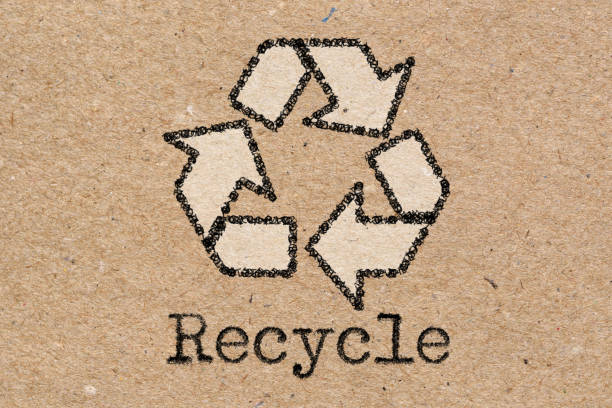 istock Recycling symbol on brown craft paper background. 1241010051