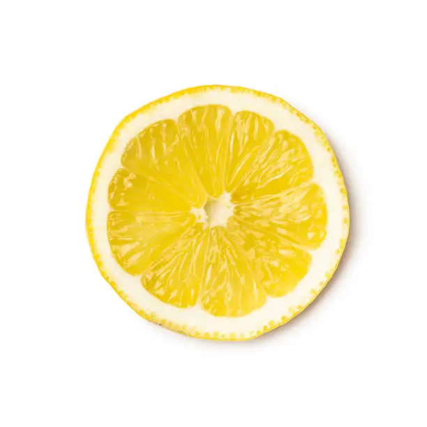 Slice of yellow lemon isolated on white background. Top view.