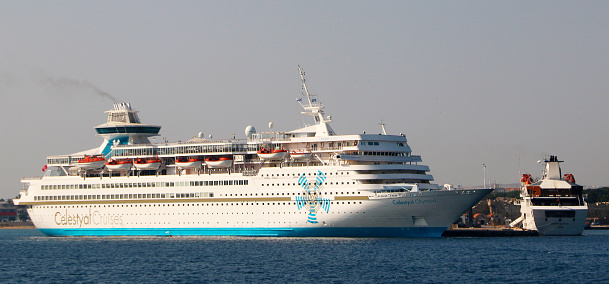 Rhodes, Greece - June 06, 2019: Celestyal Olympia cruise ship in the port of Rhodes, Mandraki harbour, Rhodes, Greece. MS Celestyal Olympia is a cruise ship owned by the Cyprus-based Celestyal Cruises, formerly Louis Cruise Lines.