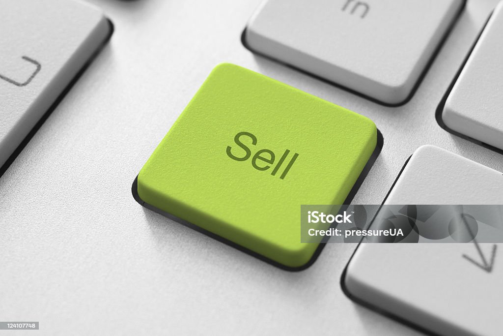 Sell Key Sell button on the keyboard. Toned Image. Keypad Stock Photo