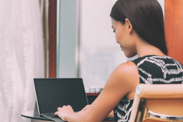 istock Working from home remote work freelance worker employee woman typing using laptop computer online communication for small business. Businesswoman at home office desk 1241094919