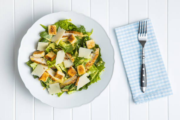 istock Chicken Caesar Salad with Cheese and Croutons 1241097957