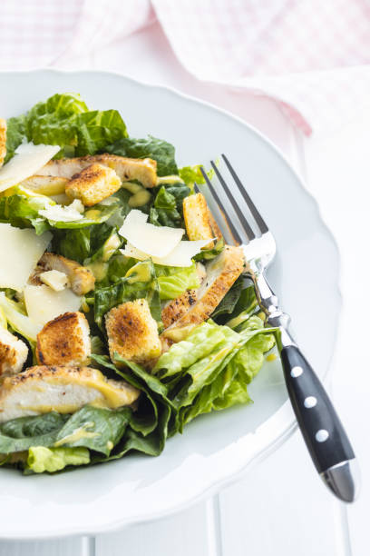 istock Chicken Caesar Salad with Cheese and Croutons 1241099507