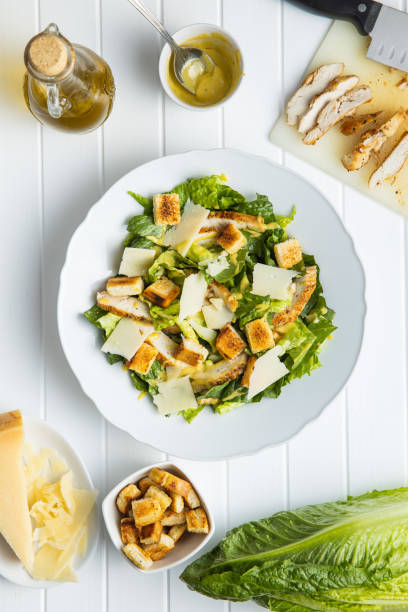 istock Chicken Caesar Salad with Cheese and Croutons 1241099519
