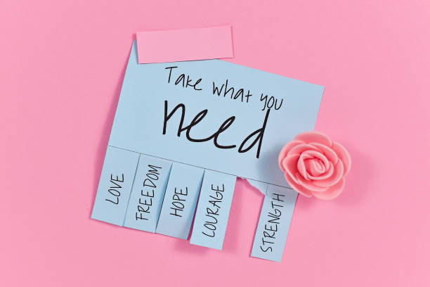 Blue tear-off stub note with handlettering text 'Take what you need' and words 'Love, Freedom, Hope, Courage' and 'Strength' on pink background with cute pink foam rose