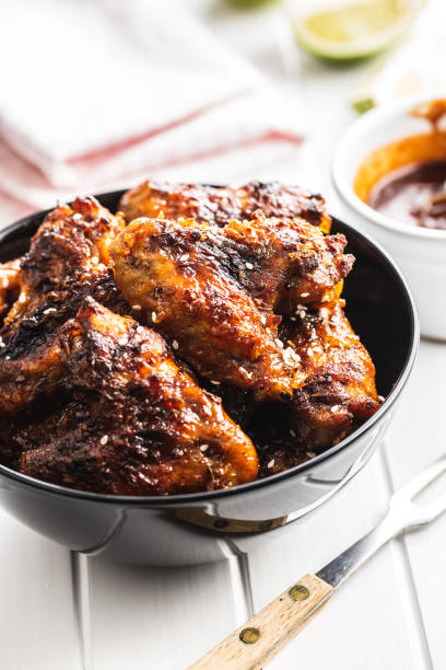 istock Grilled chicken wings in bowl. 1241114516