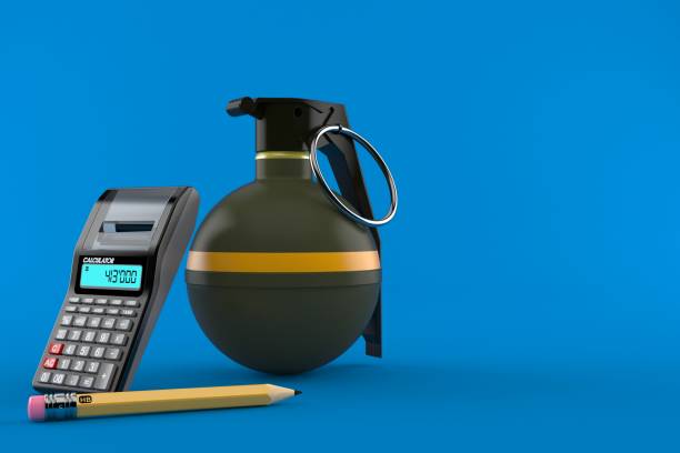 istock Hand grenade with calculator and pencil 1241117734