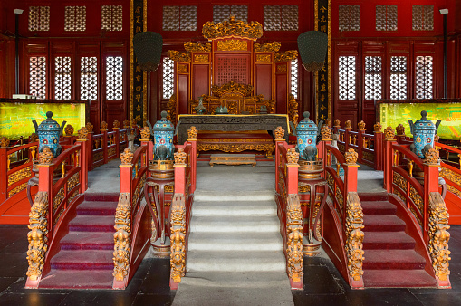 The interior of the Confucius Temple with the emperor's throne is richly decorated.