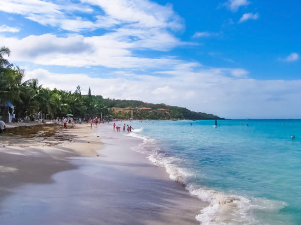 istock Dark clouds over Roatan island beache 1241152401