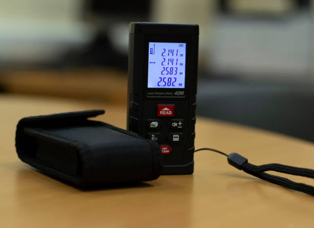 istock measured the distance from the table to the ceiling using a laser range finder 1241182852