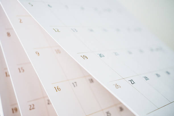 Calendar page flipping sheet close up blur background business schedule planning appointment meeting concept Calendar page flipping sheet close up blur background business schedule planning appointment meeting concept calendar today personal organizer routine stock pictures, royalty-free photos & images