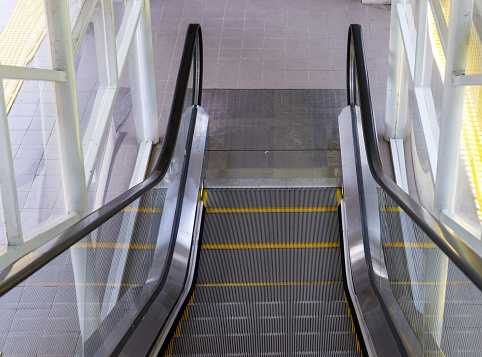 Escalator stairway on the train station