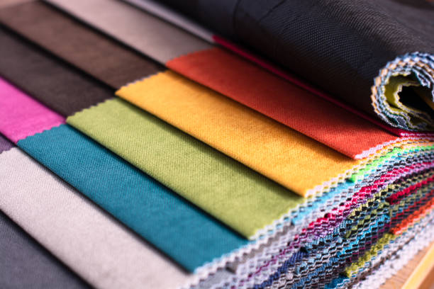 Colorful upholstery fabric samples Top view of colorful upholstery fabric samples indoors fabric swatch stock pictures, royalty-free photos & images