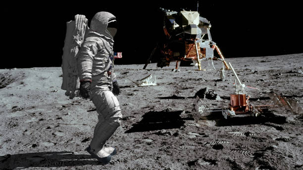 3D rendering. Astronaut walking on the moon. CG Animation. Elements of this image furnished by NASA. 3D rendering. Astronaut walking on the moon. CG Animation. Elements of this image furnished by NASA. https://www.flickr.com/photos/projectapolloarchive/21473302379/ apollo 11 stock pictures, royalty-free photos & images