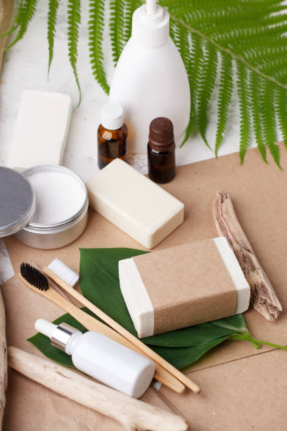 istock Bamboo toothbrushes dentifrice tooth powder natural solid soap, essential oils, dispenser on craft background. Well ness, wellbeing, selfcare concept Eco friendly, Zero waste, Plastic free 1241246756
