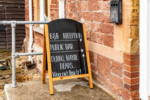 Decorative handwritten sign on a blackboard outside a bar in Brussels
