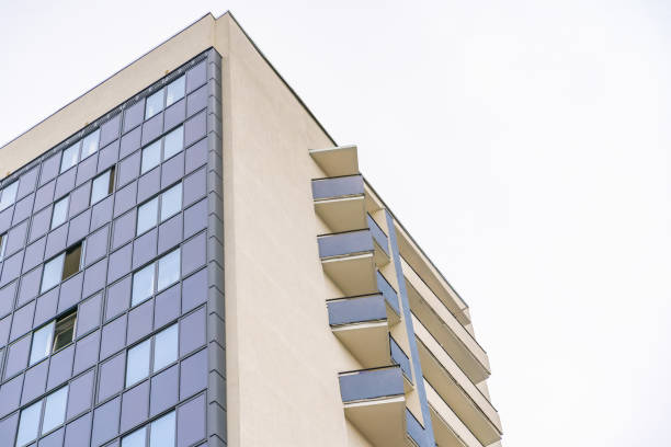 istock apartment buildings on a clear day view from below 1241289221