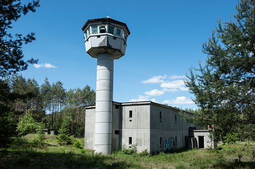 Fischbach, Rhineland Palatinate/ Germany - May 31 2020: Watchtower and administration building of the abandoned US nuclear weapons camp in Fischbach near Dahn