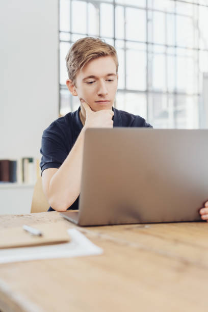 istock Thoughtful young businessman or student 1241317867