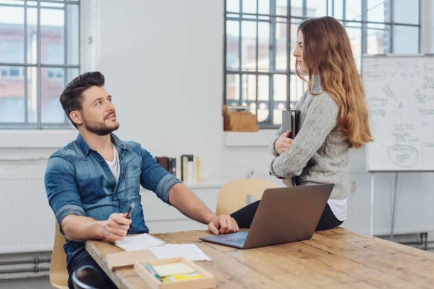 istock Two business colleagues having a discussion 1241323817