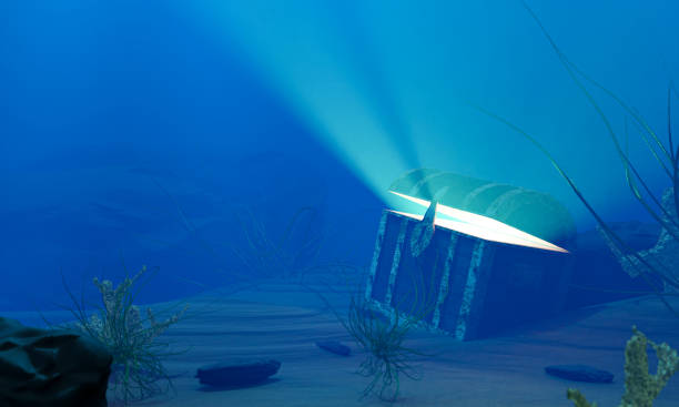 The old treasure chest sunk under the sea. The light shone out of the treasure chest. Under the sea atmosphere, there are rocks, sand, and treasure chest buried. 3D Rendering The old treasure chest sunk under the sea. The light shone out of the treasure chest. Under the sea atmosphere, there are rocks, sand, and treasure chest buried. 3D Rendering sunken stock pictures, royalty-free photos & images