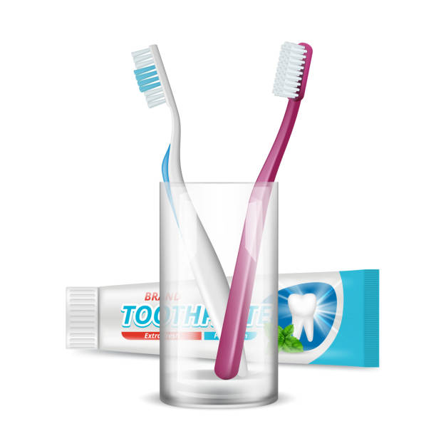 Toothbrush in glass. Dental daily protection morning hygiene plastic tube package for toothpaste vector realistic isolation Toothbrush in glass. Dental daily protection morning hygiene plastic tube package for toothpaste vector realistic isolation. Toothpaste healthcare and toothbrush in cup illustration toothbrush toothpaste backgrounds beauty stock illustrations