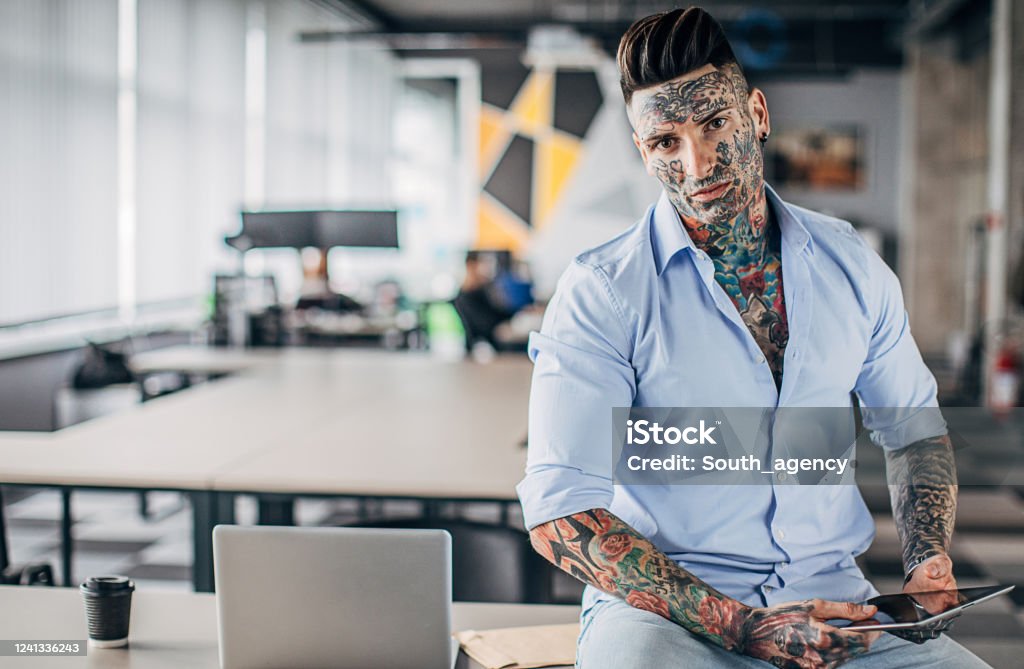 Businessman With Whole Body Covered In Tattoos In Office Stock Photo -  Download Image Now - iStock