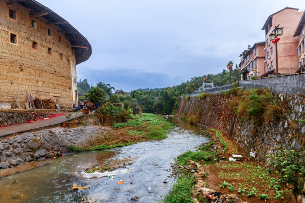 Yongding, Fujian Province / China - Dec 4, 2015: Panorama of Fujian landscape: A traditional tulou (\