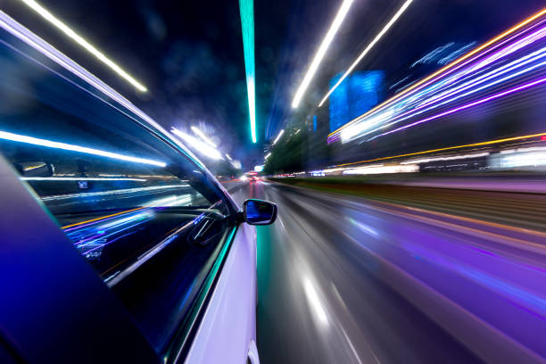 abstract background of speed traffic light trails with circle bokeh