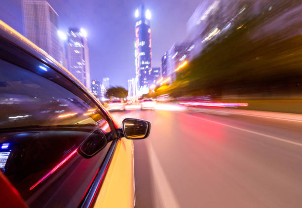 abstract background of speed traffic light trails with circle bokeh