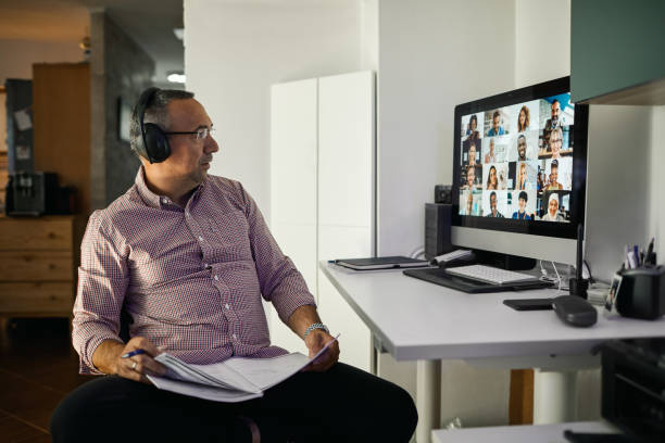 istock Businessman Working With Colleague Through Video Conferencing 1241350487