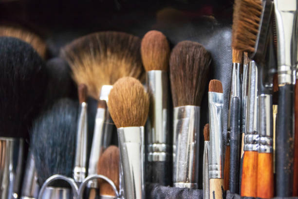 istock Collection of professional makeup brushes in case; selective focus. 1241357105