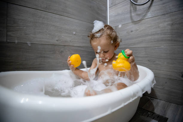 istock Cute Little Baby In Bathtub 1241363593