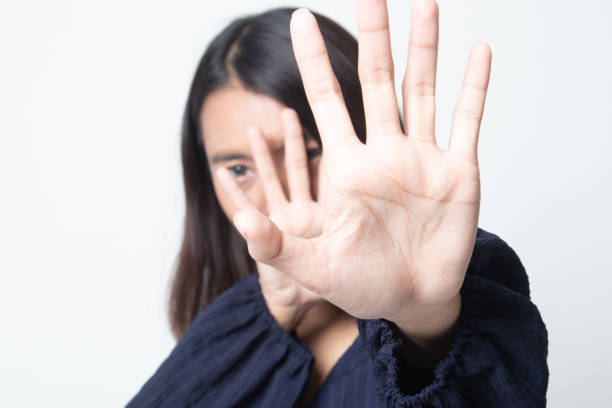 istock Young Asian woman hide her  face. 1241364784