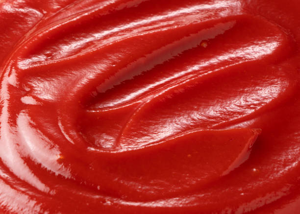 istock Wave of ketchup on the entire screen 1241367047