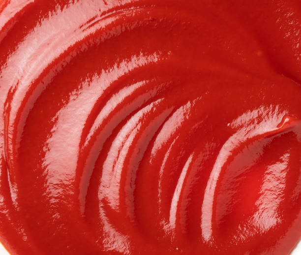 istock Wave of ketchup on the entire screen 1241369797