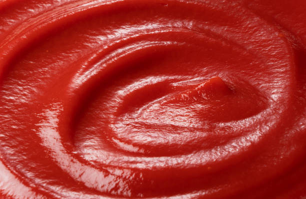 istock Wave of ketchup on the entire screen 1241373596
