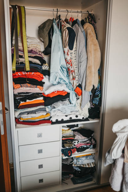 istock Wardrobe full of clothes 1241374122