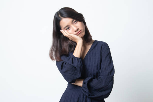 istock Beautiful young Asian woman get bored. 1241374145