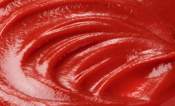 istock Wave of ketchup on the entire screen 1241374703