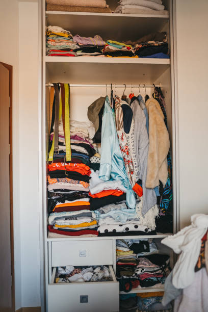 istock Wardrobe full of clothes 1241375826
