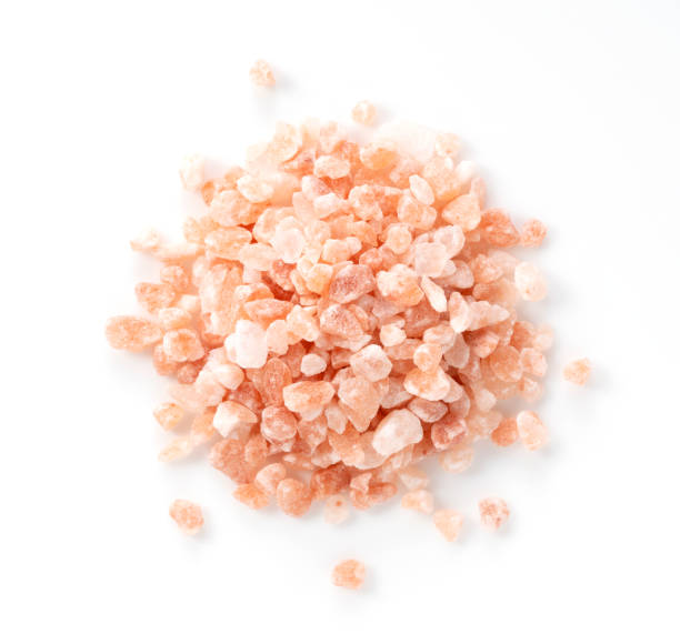 istock Pink rock salt placed on a white background 1241378726
