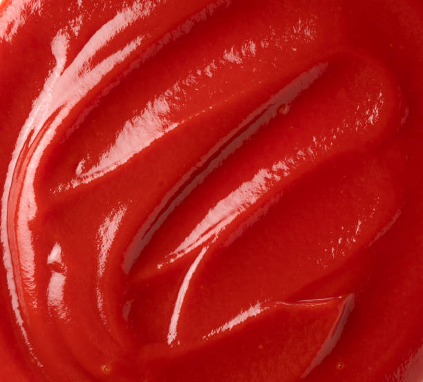 istock Wave of ketchup on the entire screen 1241381377