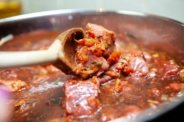 istock Stirring beef hotpot - cooking at home 1241403849