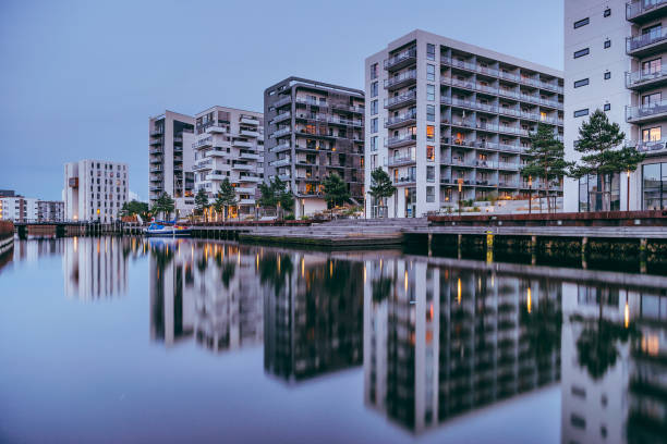 istock Residential buildings by the water 1241421700