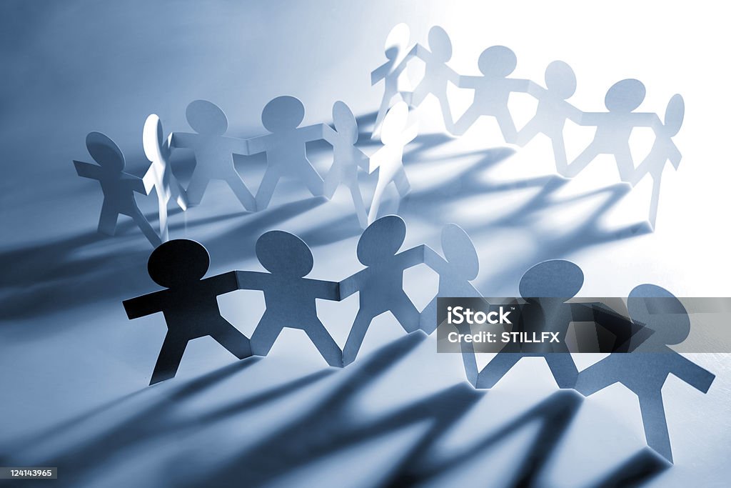 Teams Teams of people holding hands Adult Stock Photo