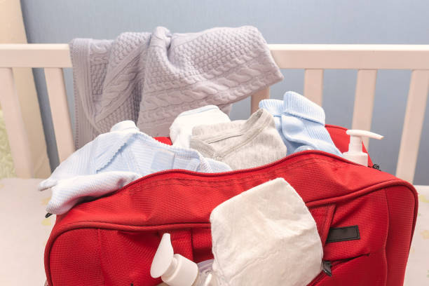 istock Big red diaper bag for maternity hospital. 1241449190